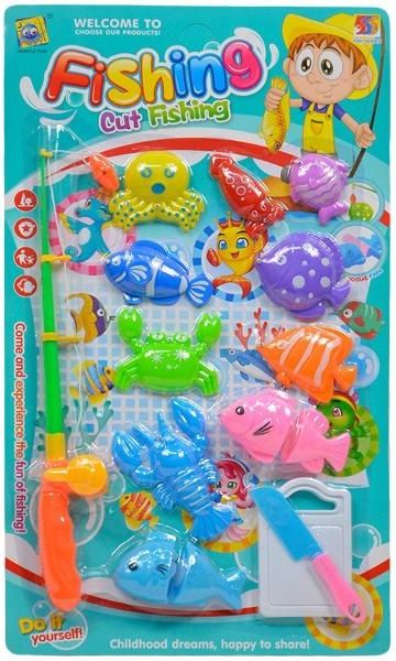 Rybářská udice s mořskými živočichy a s deskou na krájení